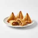chicken-samosa-on-plate.webp